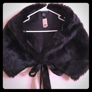Faux fur wrap with satin bow tie closure. NWT